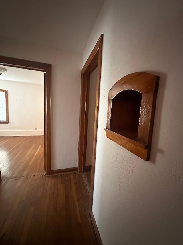 hallway featuring hardwood / wood-style floors