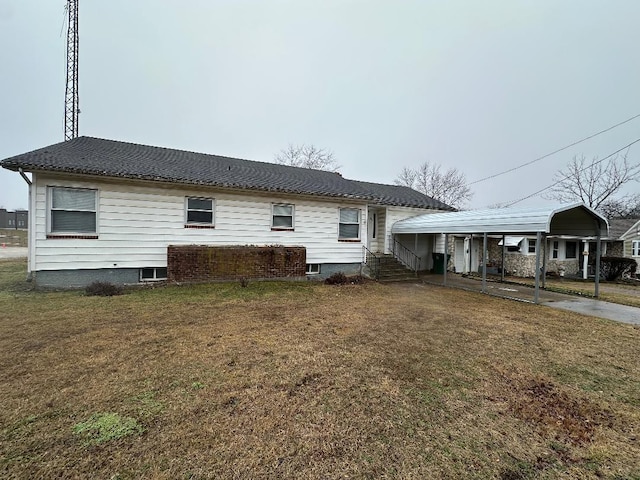 back of house with a yard