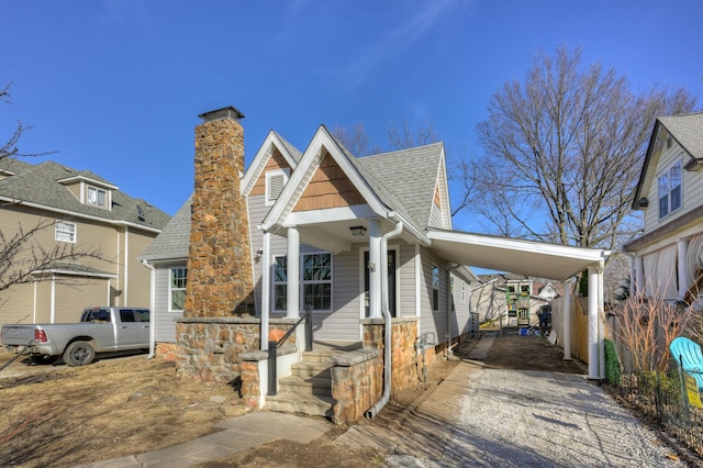 view of front of home featuring a carport