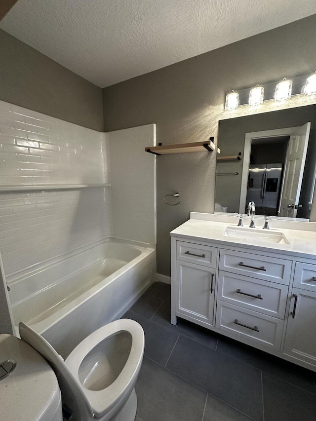 full bathroom featuring tub / shower combination, tile patterned flooring, vanity, a textured ceiling, and toilet