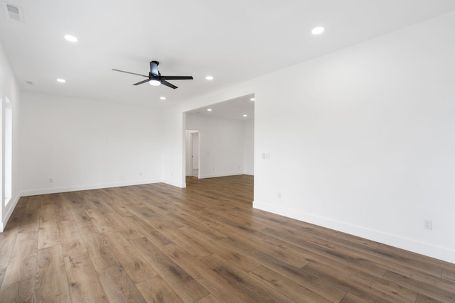 empty room with wood-type flooring and ceiling fan