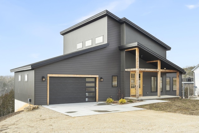 view of front of house with a balcony and a garage