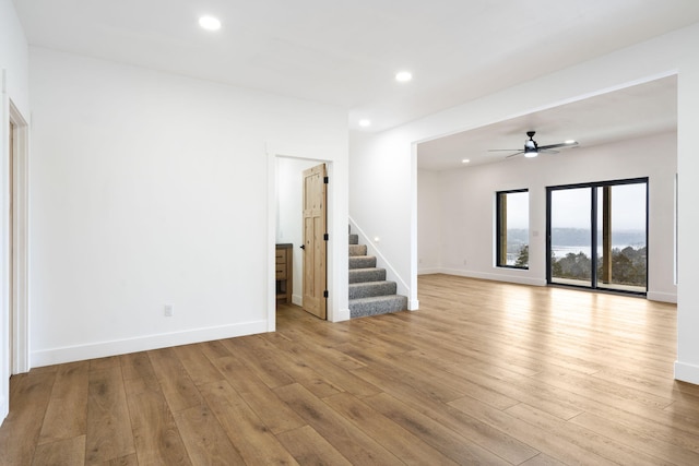 interior space featuring ceiling fan and light hardwood / wood-style floors