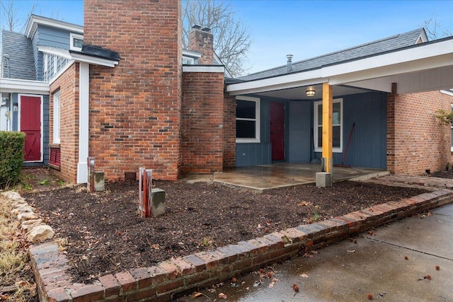 view of property exterior featuring a patio