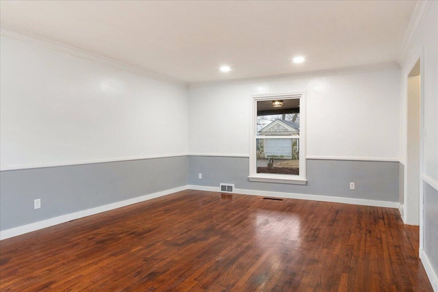 unfurnished room with dark hardwood / wood-style flooring and ornamental molding