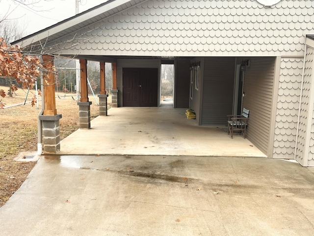 view of patio / terrace with a carport