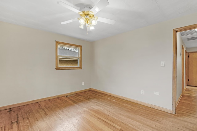 unfurnished room featuring ceiling fan and light hardwood / wood-style floors