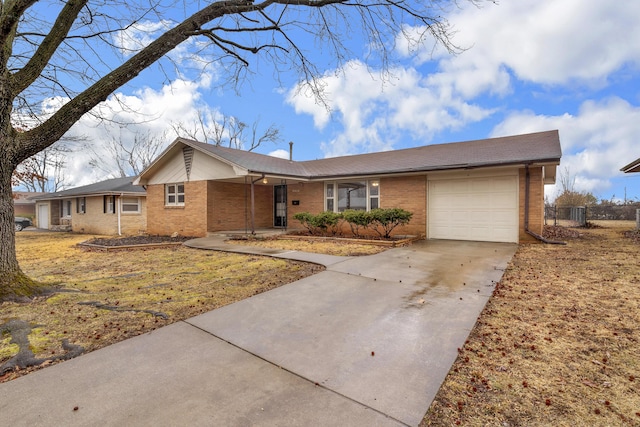 single story home with a garage