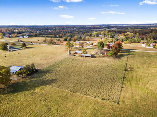 birds eye view of property featuring a rural view