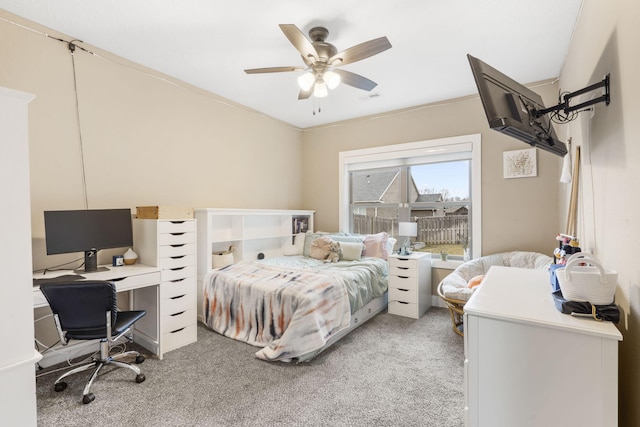 carpeted bedroom featuring ceiling fan