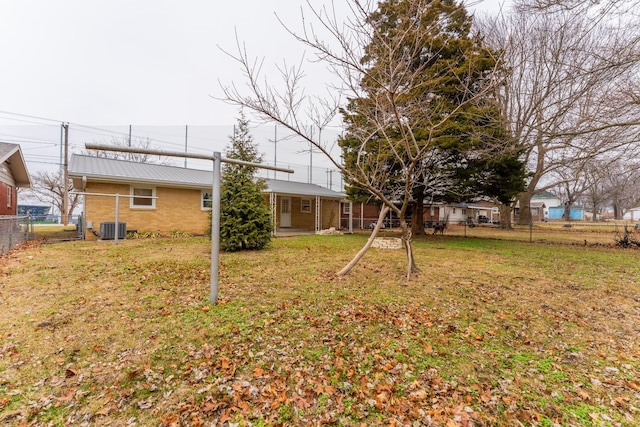 view of yard featuring central AC