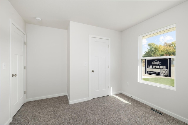 unfurnished bedroom featuring carpet floors