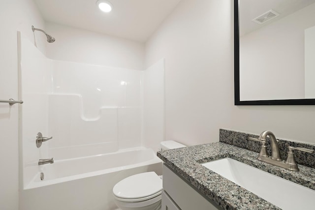 full bathroom featuring vanity, shower / bathing tub combination, and toilet