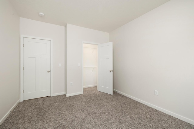 unfurnished bedroom featuring carpet flooring