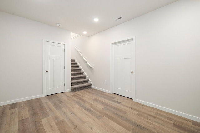 unfurnished room featuring light wood-type flooring