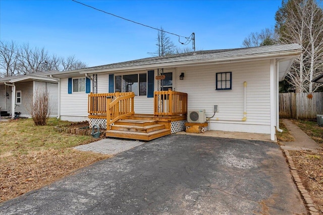 view of front of house with ac unit