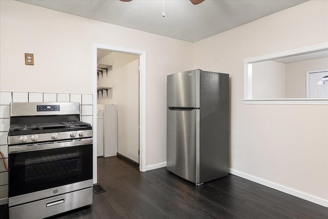 kitchen featuring dark hardwood / wood-style flooring, ceiling fan, and appliances with stainless steel finishes