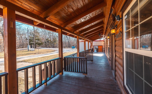 wooden deck featuring covered porch