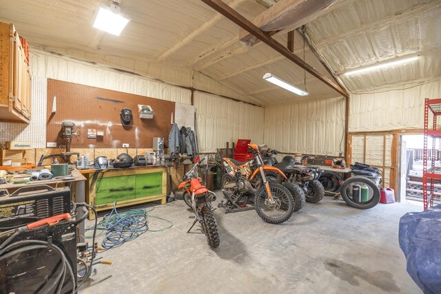 garage with a workshop area