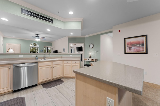 kitchen with sink, a center island, ornamental molding, light brown cabinetry, and stainless steel dishwasher