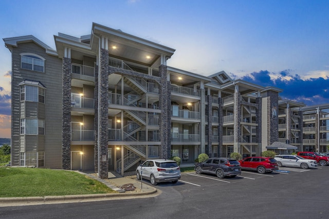 view of outdoor building at dusk