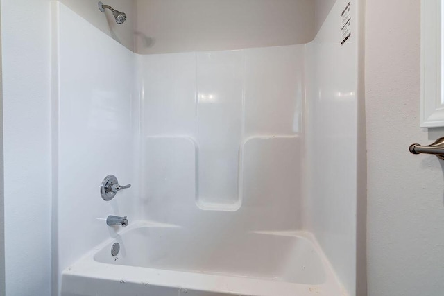 bathroom featuring shower / washtub combination