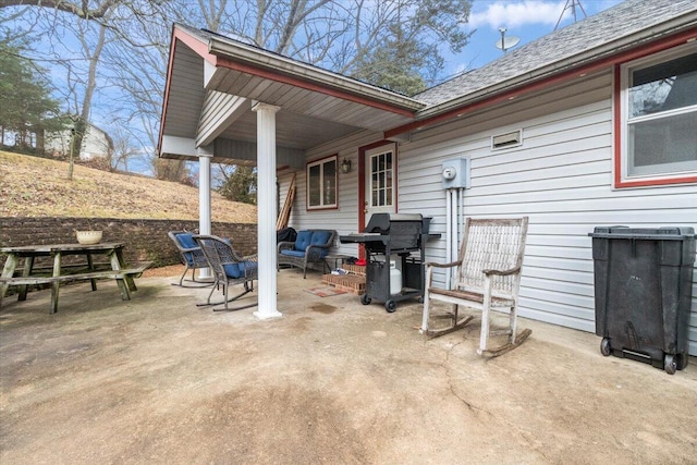 view of patio / terrace featuring a grill