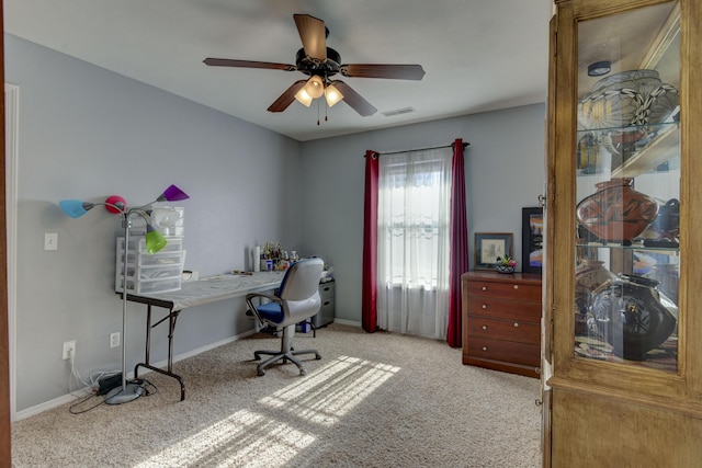 office featuring light colored carpet and ceiling fan