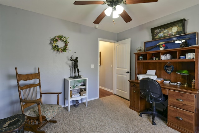 carpeted office with ceiling fan