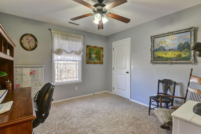 office with ceiling fan and carpet flooring