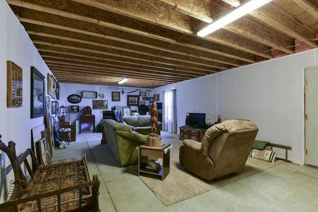 living room featuring concrete floors