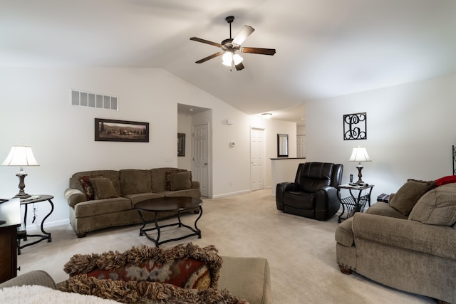 carpeted living room featuring ceiling fan and vaulted ceiling