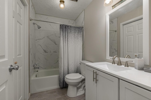 full bathroom featuring vanity, wood-type flooring, a textured ceiling, toilet, and shower / bath combo with shower curtain