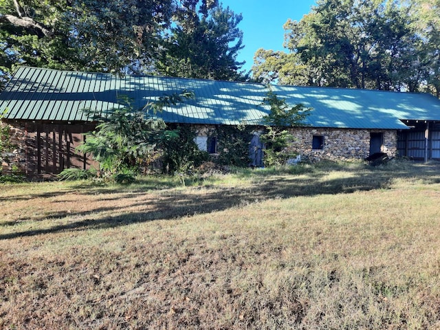 exterior space with a front lawn