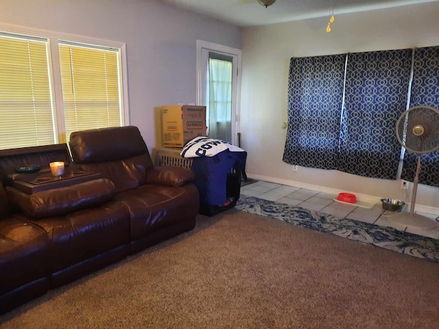 living room with tile patterned flooring