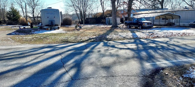 view of yard featuring a carport