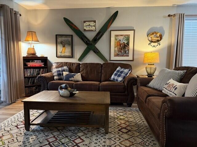 living room with light hardwood / wood-style flooring