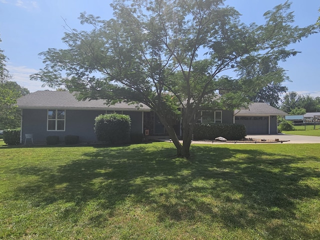 view of yard featuring a garage