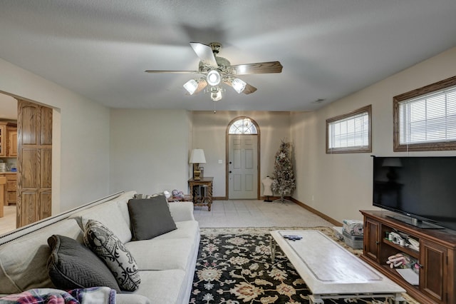 living room with ceiling fan