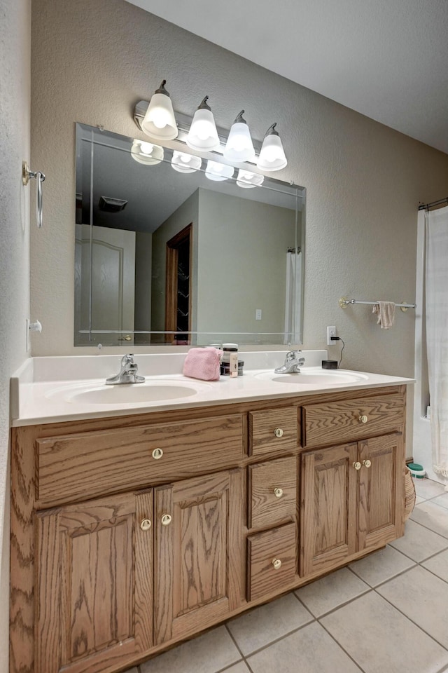 bathroom featuring vanity and tile patterned floors