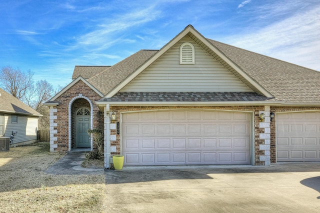 view of front of home featuring central air condition unit