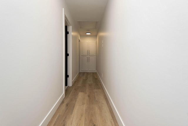 hallway featuring light wood-type flooring