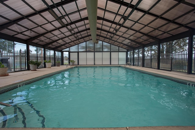 view of pool featuring a lanai