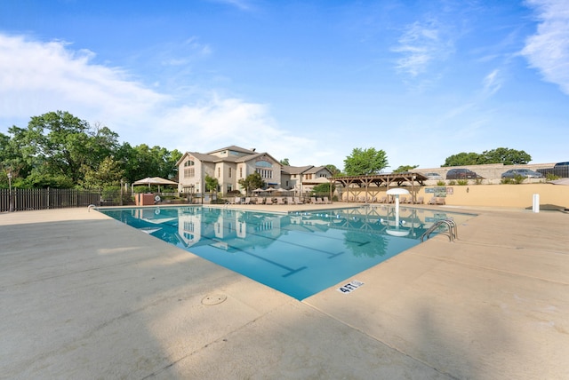 view of pool featuring a patio