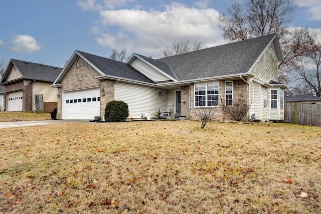 view of front facade featuring a garage and a front yard