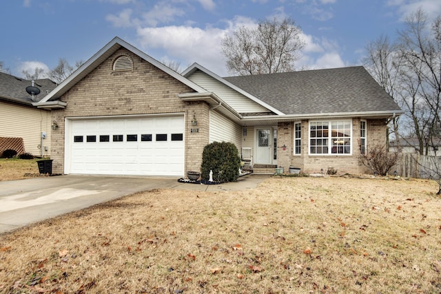 view of front facade featuring a garage and a front lawn