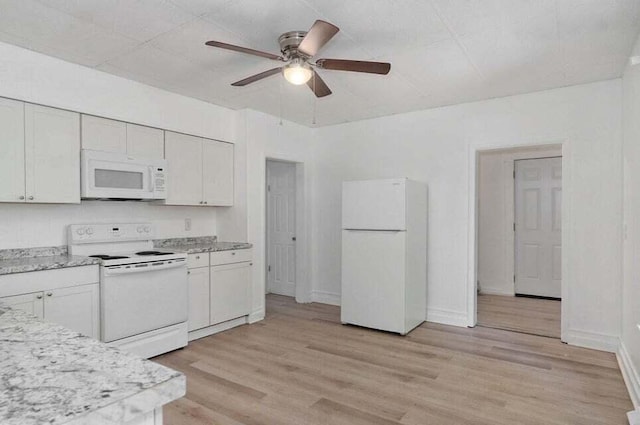 kitchen featuring ceiling fan, white appliances, light hardwood / wood-style floors, and white cabinets