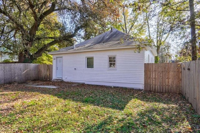 view of property exterior featuring a yard