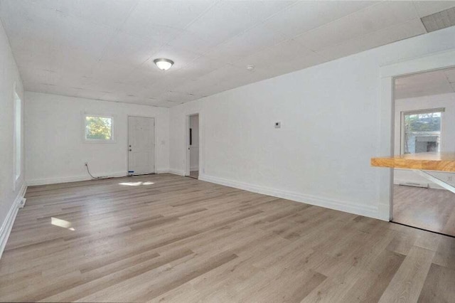 empty room featuring light hardwood / wood-style flooring