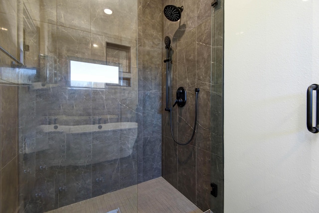 bathroom with an enclosed shower